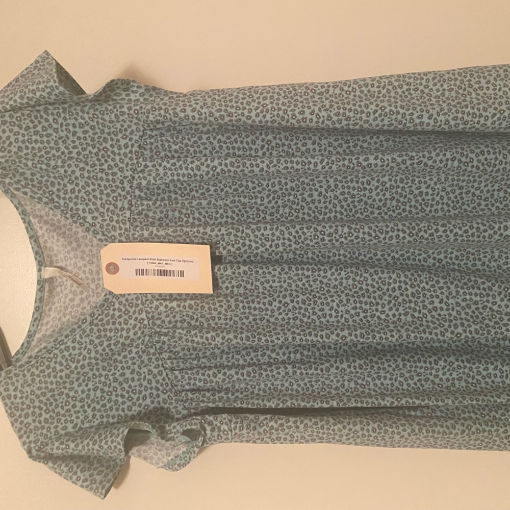 Turquoise leopard print babydoll knot top size medium